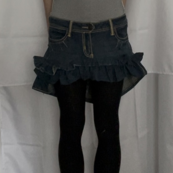 Screenshot threepleat mini skirt