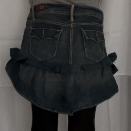 Screenshot threepleat mini skirt