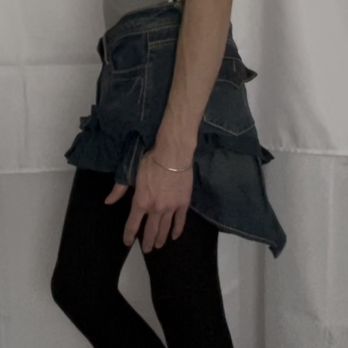 Screenshot threepleat mini skirt