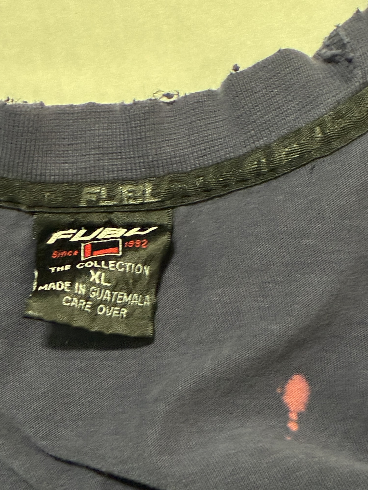 FUBU worn & torn